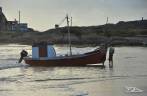 O dia nasce e os barcos de pesca já saem ao mar, em Punta del Diablo, no litoral do Uruguai